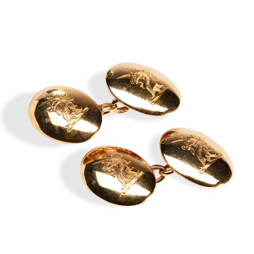 72 - A PAIR OF 18CT GOLD ENGRAVED CUFFLINKSthe four domed oval discs each engraved with the motif of a un... 