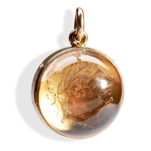 158 - A ROCK CRYSTAL PENDANT WITH GEORGE III SOVEREIGNin the shape of an orb, the sovereign being set betw... 