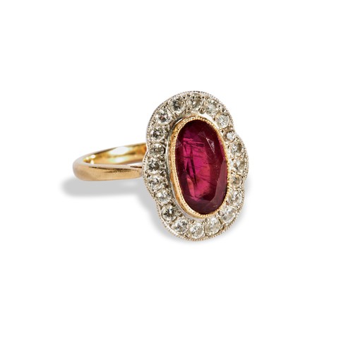 104 - A PINK TOURMALINE AND DIAMOND RINGoval mix cut, milgrain bezel set, pink tourmaline, surrounded by 2... 