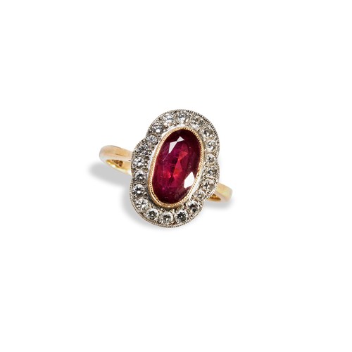 104 - A PINK TOURMALINE AND DIAMOND RINGoval mix cut, milgrain bezel set, pink tourmaline, surrounded by 2... 