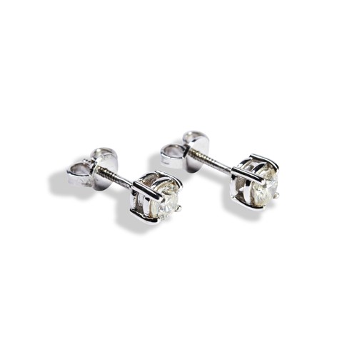 131 - A PAIR OF DIAMOND STUD EARRINGSeach brilliant-cut diamond four claw set on a white gold post and scr... 