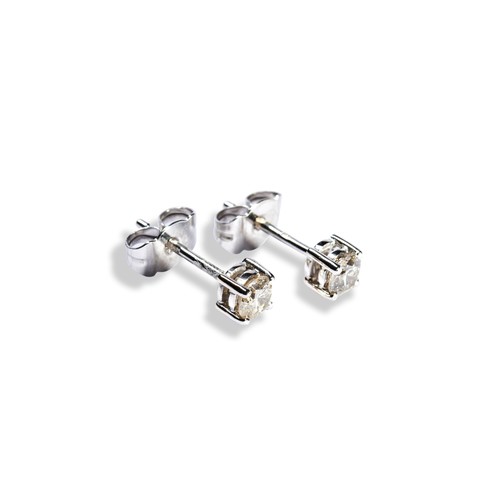 130 - A PAIR OF DIAMOND STUD EARRINGSeach brilliant-cut diamond four claw set on a white gold post and but... 