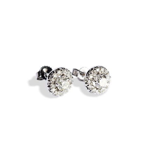 135 - A PAIR OF DIAMOND CLUSTER STUD EARRINGSeach a round cut diamond set with four claws in a halo of rou... 