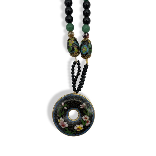 111 - A CLOISONNE NECKLACE AND TWO PEARL NECKLACES the large cloisonne pendant disc of floral design on a ... 