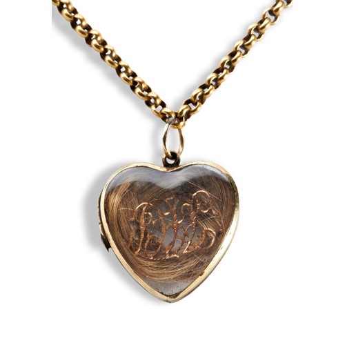 160 - A VICTORIAN HEART LOCKET NECKLACE, CIRCA 1860composed of nine heart shaped lockets, containing plait... 