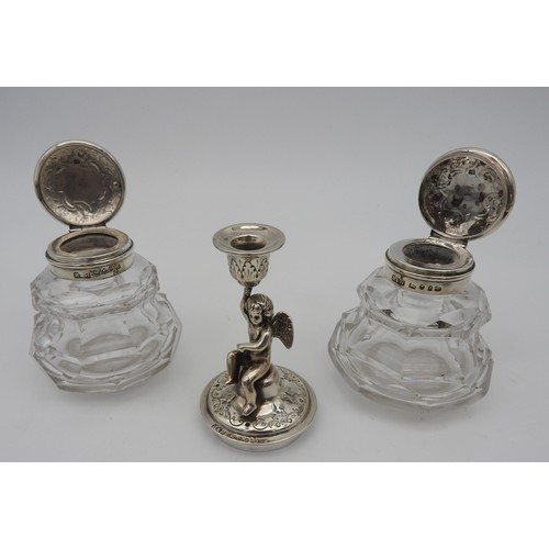 295 - AN ELEGANT SILVER INK STAND, profuse chased foliate decoration with scroll edge, raised on four scro... 