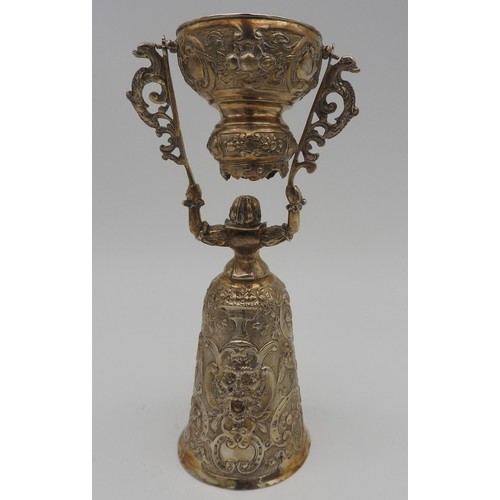 286 - A DUTCH SILVER GILT MARRIAGE CUP, 19th Century, in the form of a lady in formal dress with engraving... 