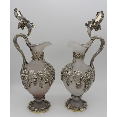 301 - AN IMPRESSIVE PAIR OF VICTORIAN SILVER MOUNTED CLARET JUGS AND STANDSJAMES SAMUEL HUNT, LONDON 1844,... 