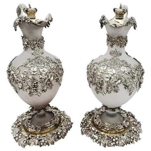 301 - AN IMPRESSIVE PAIR OF VICTORIAN SILVER MOUNTED CLARET JUGS AND STANDSJAMES SAMUEL HUNT, LONDON 1844,... 