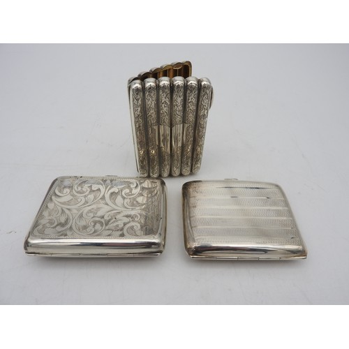 322 - THREE SILVER CIGARETTE CASES, TWO EDWARDIAN AND ONE GEORGE V, various engraved and engine turned dec... 