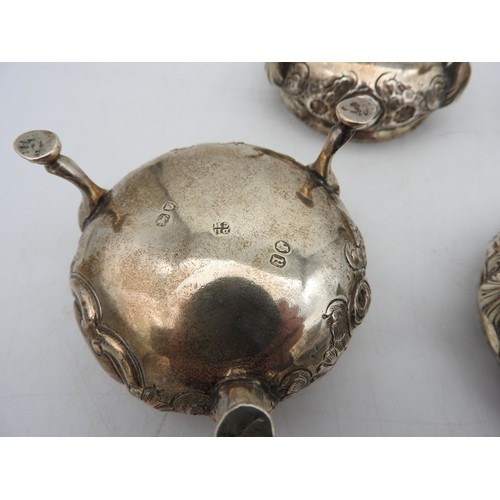 340 - A SET OF FOUR VICTORIAN SILVER SALTS, circular form, gadrooned rim with floral repousse decoration, ... 