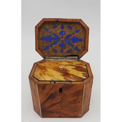 211 - AN TORTOISESHELL TEA CADDY, EARLY 19TH CENTURY, rectangular form with canted corners, hinged dome to... 