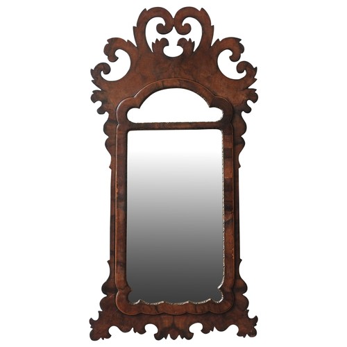 97 - AN ENGLISH WALNUT FRET CARVED PIER MIRROR, EARLY 19TH CENTURYcirca 1830elegant scroll work frame, th... 