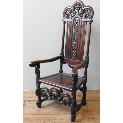 78 - EIGHT LATE 17TH CENTURY OAK HIGH BACK CHAIRS, comprised of an impressive armchair with pierced scrol... 