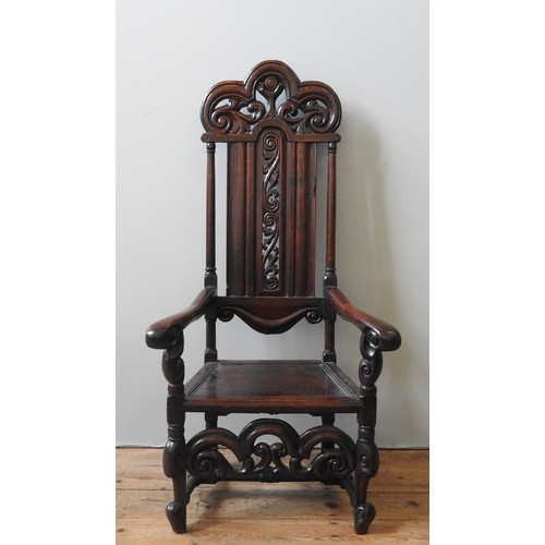 78 - EIGHT LATE 17TH CENTURY OAK HIGH BACK CHAIRS, comprised of an impressive armchair with pierced scrol... 