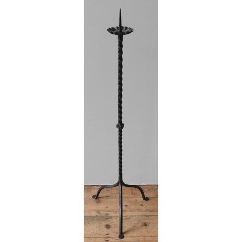 104 - A 17TH CENTURY IRON PRICKET CANDLESTICK