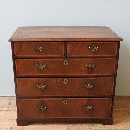 73 - AN 18TH CENTURY WALNUT CROSS BANDED PROVINCIAL CHEST OF DRAWERS, CIRCA 1780, moulded plinth top, two... 