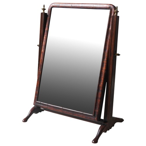 96 - A GEORGE II WALNUT TOILET MIRROR, MID 18TH CENTURYwith a bevelled plate in a moulded cushion frame, ... 