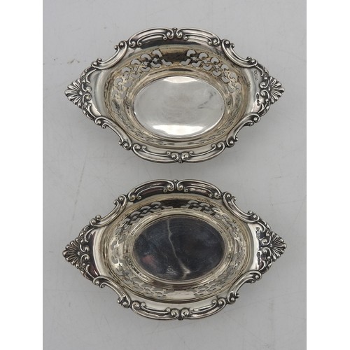 330 - A PAIR OF EDWARDIAN SILVER BON BON DISHES, CIRCA 1901oval form with scroll foliate edge and pierced ... 