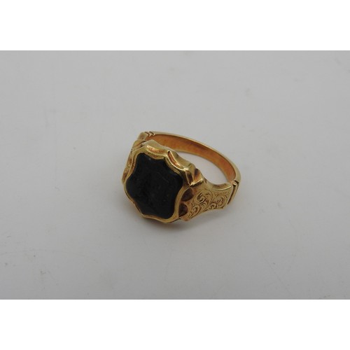 308 - A 15CT GOLD AND BLOODSTONE INTAGLIO SIGNET RING, 19TH CENTURY, the cartouche setting inset with bloo... 