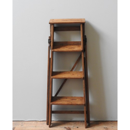 71 - A LATE 19TH CENTURY PINE STEP LADDER, four tread folding 'A' frame