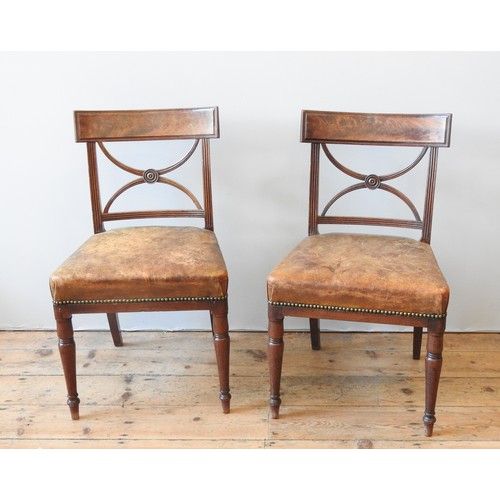 68 - A SET OF FIVE REGENCY MAHOGANY DINING CHAIRS, CIRCA 1810, panelled top rails above X-shaped splats, ... 