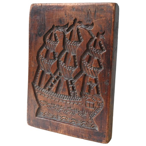 359 - A DUTCH FRUIT WOOD GINGERBREAD MOULD, LATE 18TH CENTURY, one side carved with an image of a galleon,... 