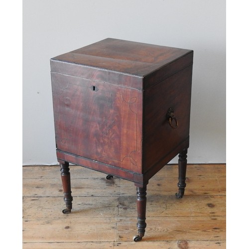 43 - A REGENCY MAHOGANY TEAPOY, CIRCA 1820, simplistic square form, the hinged top enclosing zinc cannist... 