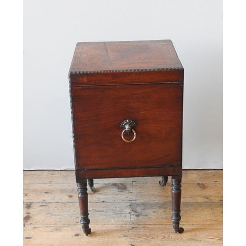 43 - A REGENCY MAHOGANY TEAPOY, CIRCA 1820, simplistic square form, the hinged top enclosing zinc cannist... 