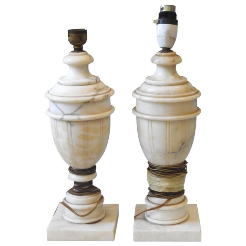 118 - A PAIR OF VINTAGE ALABASTER TABLE LAMPS, EARLY 20TH CENTURY, urn form with turned stepped tops and f... 