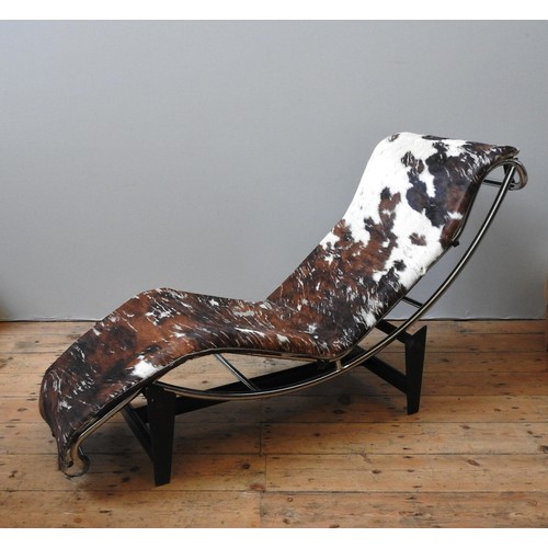 62 - AFTER LE CORBUSIER, A CHROMED TUBULAR STEEL CHAISE LOUNGE, a copy of the celebrated LC4 model, elega... 