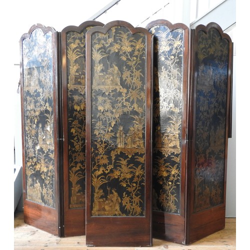 85 - A CHINOSERIE DECORATED SIX FOLD SCREEN, 19TH CENTURY, the arched leather panels decorated with scene... 