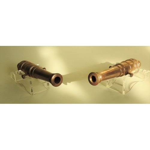 201 - A PAIR OF POLISHED BRONZE CANNON REPLICAS, LATE 19TH CENTURY, based on 18th century British naval ca... 