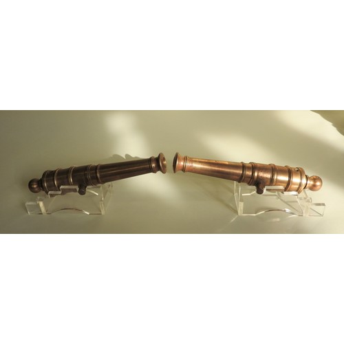 201 - A PAIR OF POLISHED BRONZE CANNON REPLICAS, LATE 19TH CENTURY, based on 18th century British naval ca... 