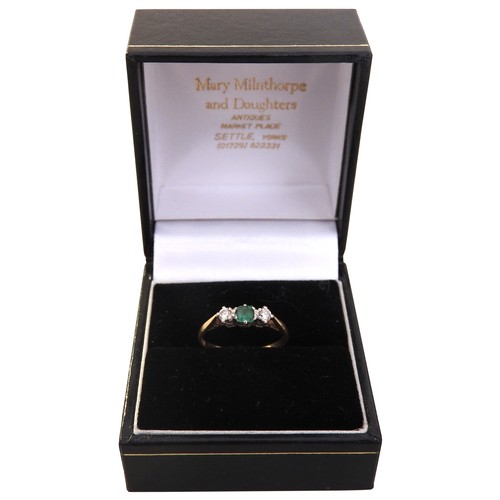 300 - A EMERALD AND DIAMOND SET 18CT GOLD RING, square cut central emerald flanked by two brilliant cut di... 