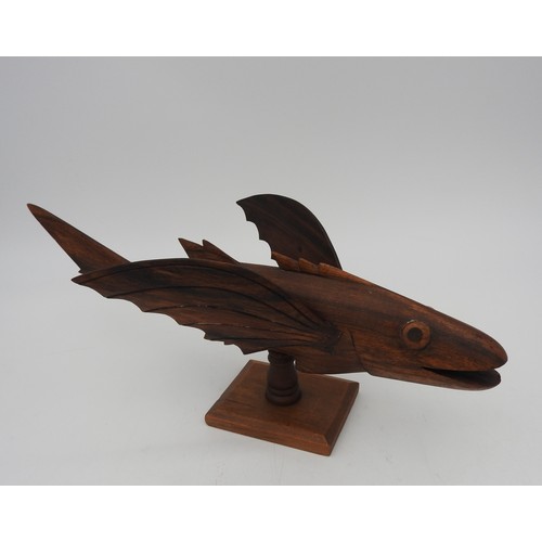 282 - A VINTAGE CARVED SOUVENIR FLYING FISH, CIRCA 1950, carved from Miro wood by inhabitants of Pitcairn ... 