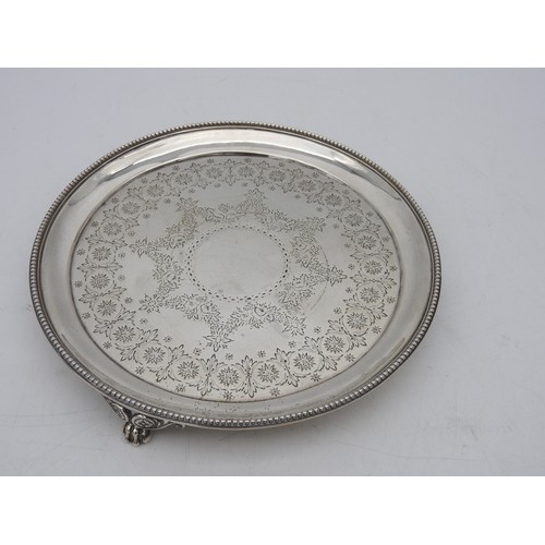 343 - A VICTORIAN SILVER SALVER, CIRCA 1870with beaded edge, circular cartouche surrounded by engraved flo... 