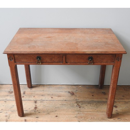 74 - A GOTHIC REVIVAL OAK WRITING TABLE BY GILLOWS, LATE 19TH CENTURY, attributed to A.W.N Pugin, three b... 