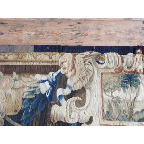 360 - A FINE LATE 17TH /18TH CENTURY FRENCH BORDER TAPESTRY, central scroll cartouche depicting rural scen... 