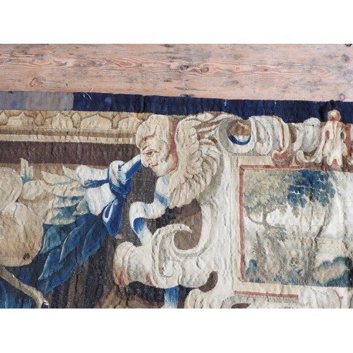 360 - A FINE LATE 17TH /18TH CENTURY FRENCH BORDER TAPESTRY, central scroll cartouche depicting rural scen... 