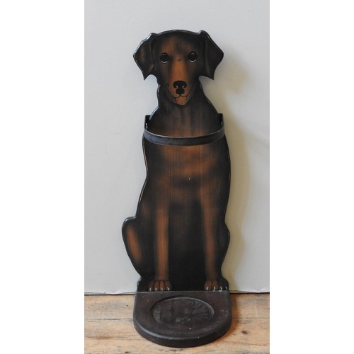 377 - A PAINTED PINE STICK STAND, 20TH CENTURY, in the form of a seated hound79 cm high