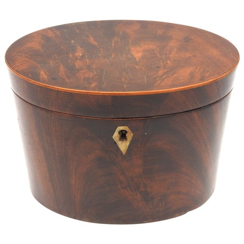 210 - A GEORGE III MAHOGANY TEA CADDY, CIRCA 1820, simplistic oval form with hinged lid