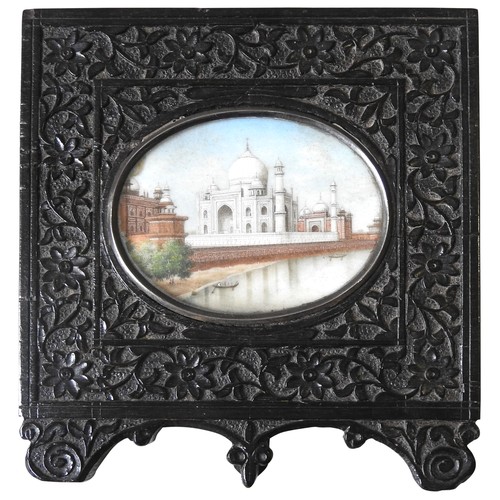 285 - A INDIAN PAINTED MINIATURE OF TAJ MAHAL, LATE 19TH CENTURY, painted on an oval ivory panel, in an or... 