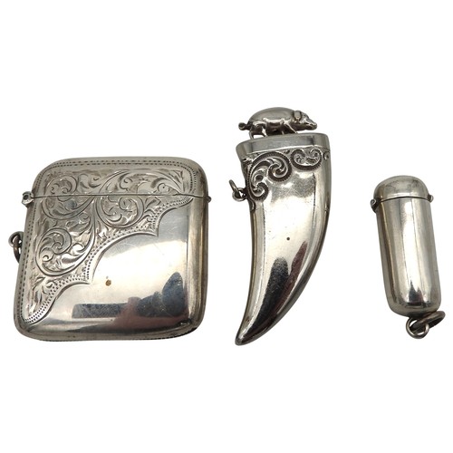 317 - AN EDWARDIAN SILVER VESTA, SILVER PIN CASE AND WHITE METAL VESTA, the white metal vesta modelled as ... 