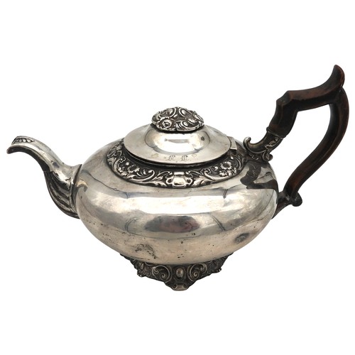 329 - A GERMAN SILVER TEA POT, CIRCA 1860, compressed globular form with scroll spout and wooden scroll ha... 