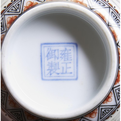 267 - AN IRON-RED AND GRISAILLE DECORATED INSCRIBED TEA BOWL QIANLONG MARK, 20TH CENTURYpainted with an in... 