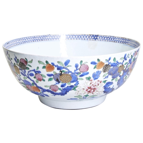 250 - LARGE CHINESE EXPORT FAMILLE ROSE BOWLQIANLONG PERIOD (1736-1795)painted with peonies and fruiting b... 