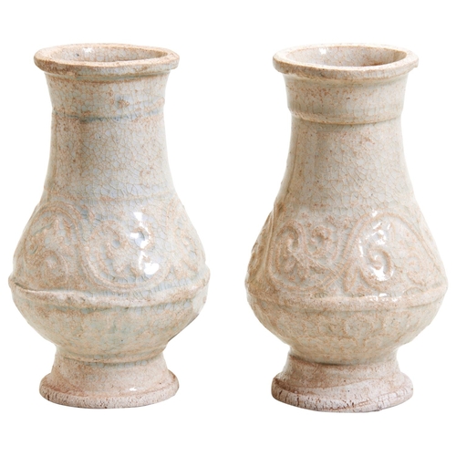 177 - PAIR OF PALE CELADON VASESSONG DYNASTY OR LATERthe baluster sides carved with a band of stylised scr... 