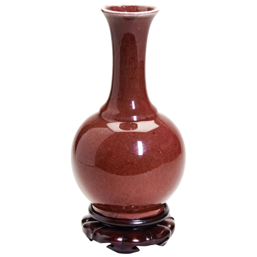 166 - A FLAMBE RED-GLAZED BOTTLE VASEJIAQING / DAOGUANG PERIODcovered throughout in a rich mottled raspber... 