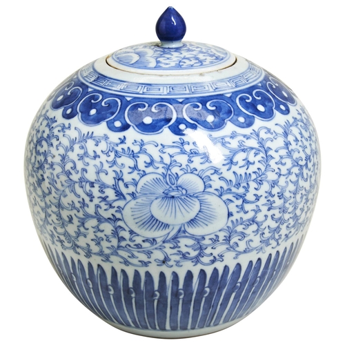 127 - A CHINESE BLUE AND WHITE JAR AND COVERLATE QING DYNASTYthe sides decorated with lotus blooms and scr... 